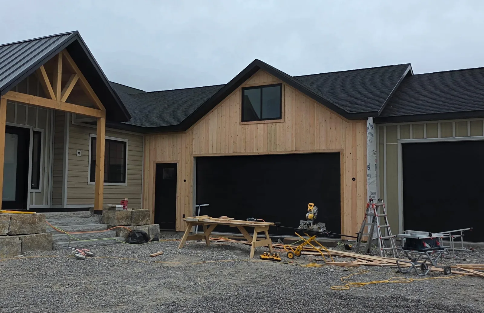Cedar Accent Home with Black Metal Roof in Williston, ND